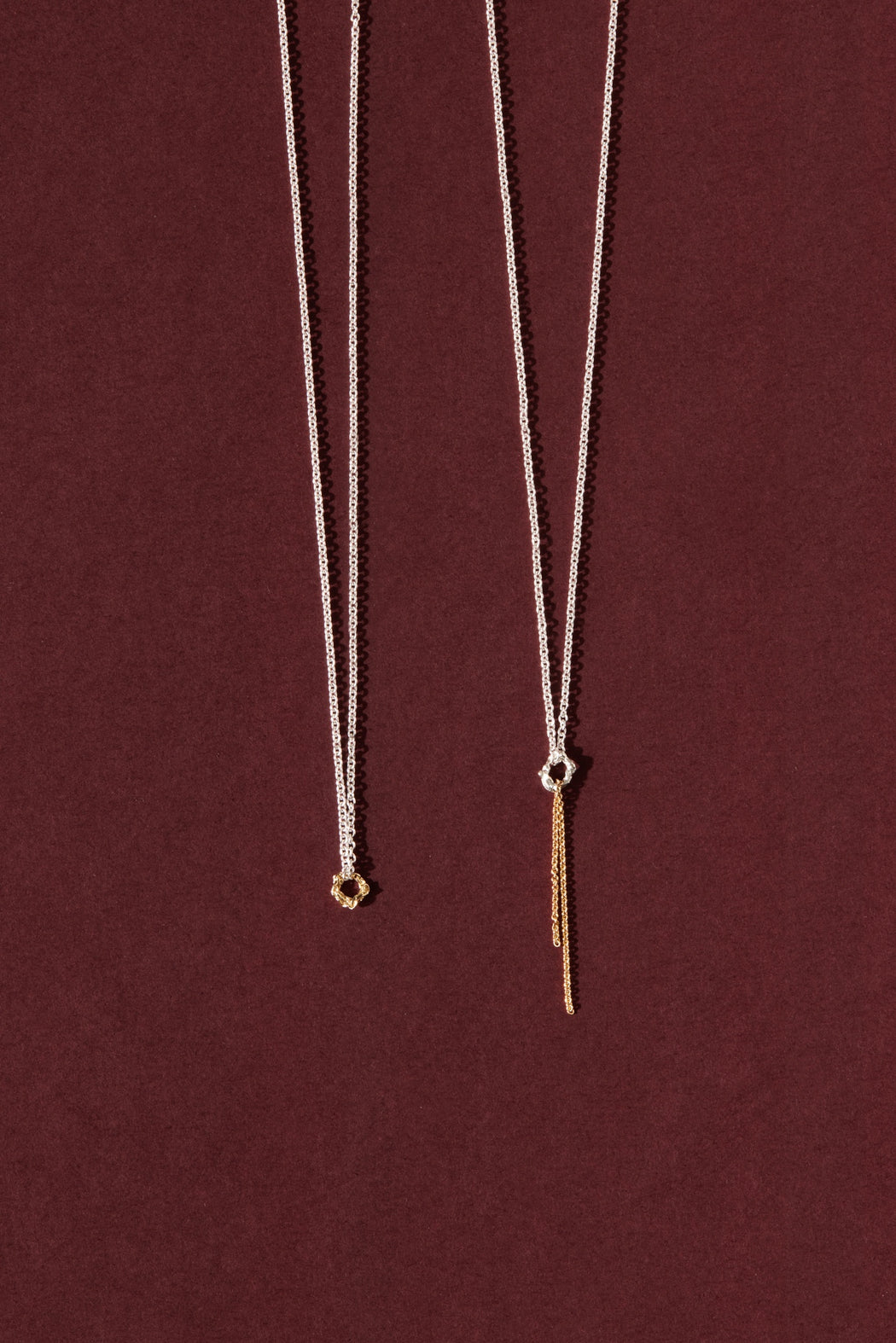 Two delicate chain with charm necklaces in silver and 10k yellow gold by Camillette Jewelry